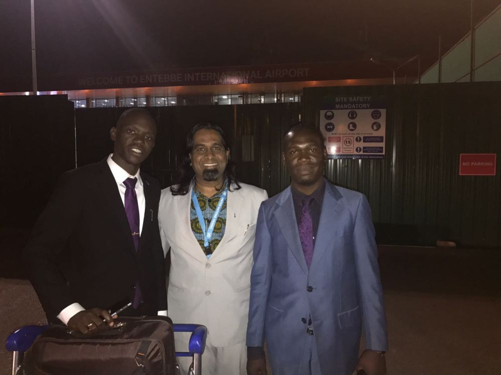 Kivumbi Earnest Bnejamin &amp; Don Vicent Bwana recieve DR. APOSTLE PAUL KARL VICTOR SR (7)