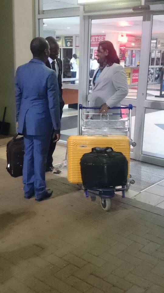 Kivumbi Earnest Bnejamin &amp; Don Vicent Bwana recieve DR. APOSTLE PAUL KARL VICTOR SR (8)